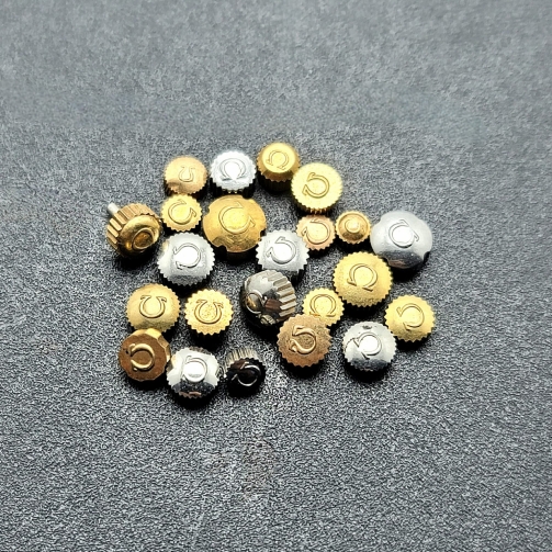LOT OF 23 VINTAGE OMEGA WATCH GOLDEN AND SILVER CROWNS FOR PARTS