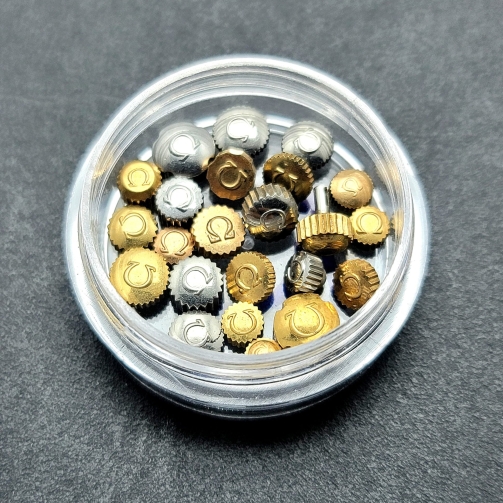 LOT OF 23 VINTAGE OMEGA WATCH GOLDEN AND SILVER CROWNS FOR PARTS
